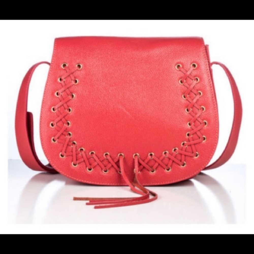 Brand new never used still in plastic Violetta coral saddle bag